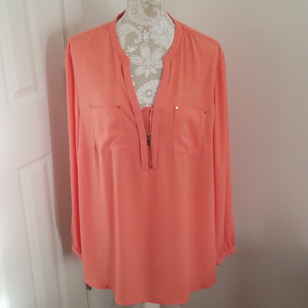 Luxurious blouse in deep sea coral